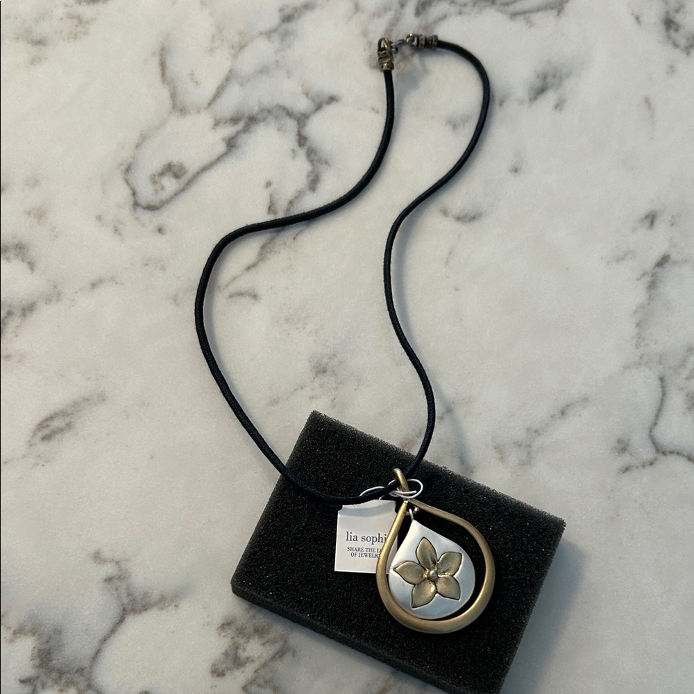 Lia Sophia Black and Gold Floral Pendant Necklace, Azalea slide